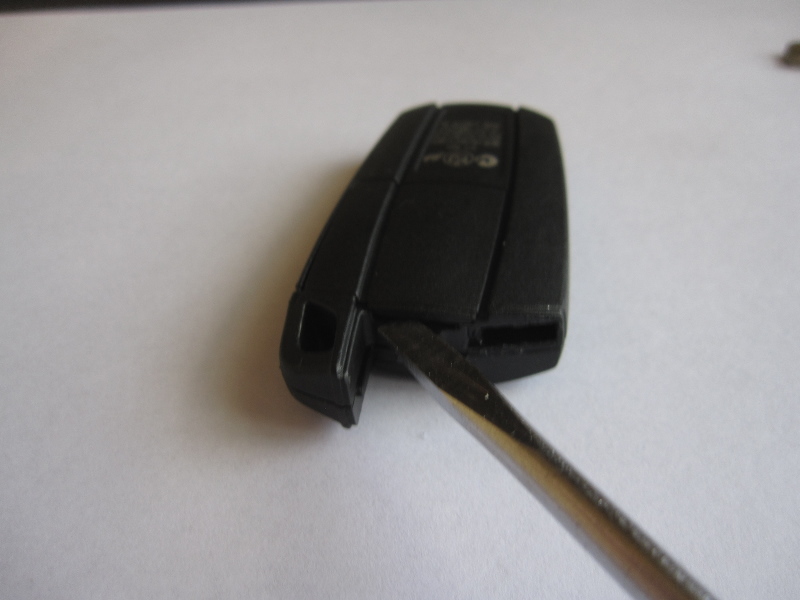 Removing battery from bmw key #7